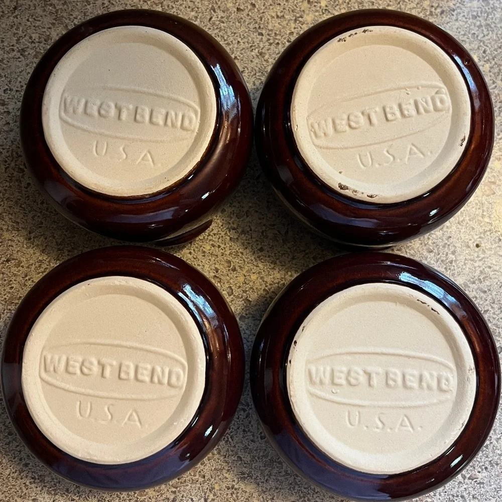 Vintage set of four West Bend bean pots. No. 5.109 with original box.